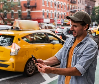Man booking taxi online.